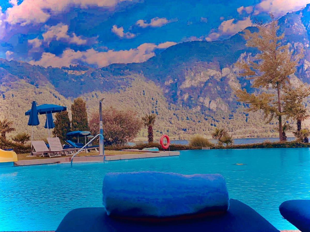Lake Apartment 4 Bissone Bagian luar foto