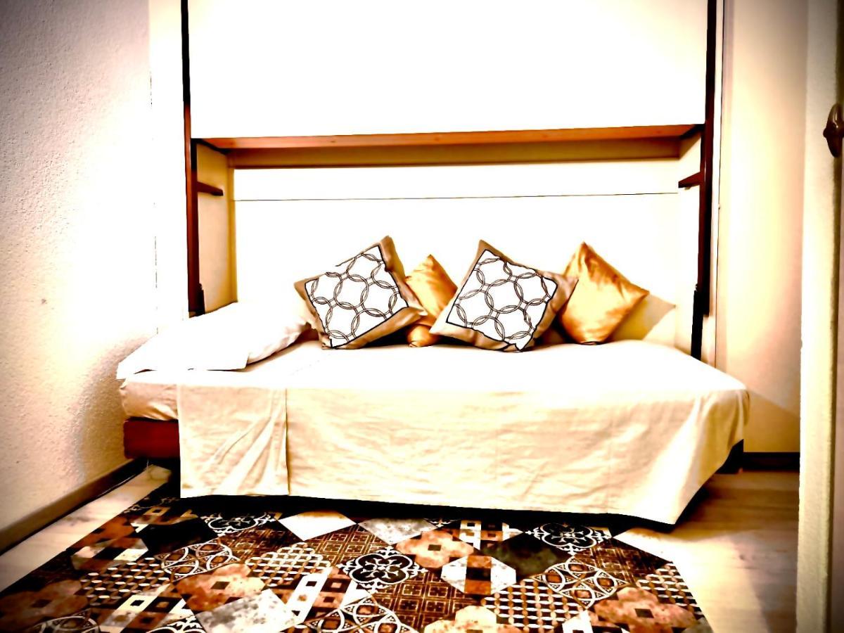 Lake Apartment 4 Bissone Bagian luar foto